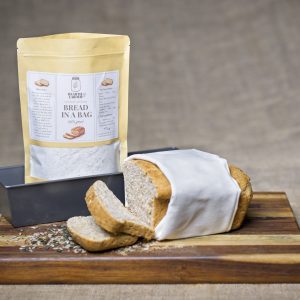 Bread in a Bag Kit with pre-measured ingredients, mixing bag, and step-by-step bread-making booklet
